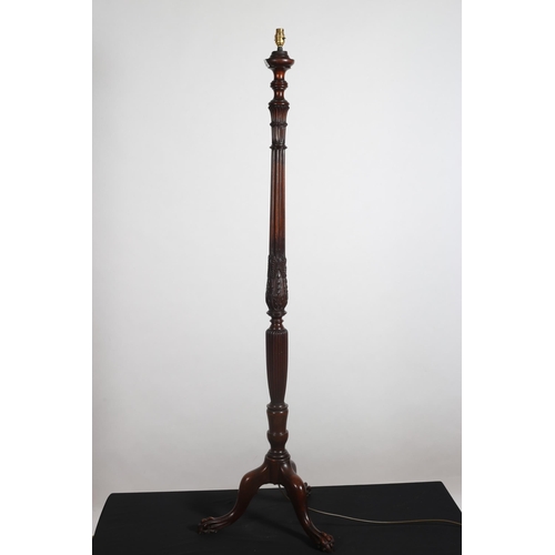 440 - A HEPPLEWHITE STYLE MAHOGANY STANDARD LAMP the cluster reeded and carved column on tripod support wi... 