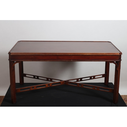 442 - A HEPPLEWHITE STYLE MAHOGANY COFFEE TABLE of rectangular outline the shaped top with canted angles o... 