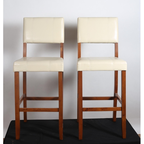 444 - A PAIR OF CHERRYWOOD AND REXINE UPHOLSTERED HIGH STOOLS each with a rectangular back and seat on squ... 