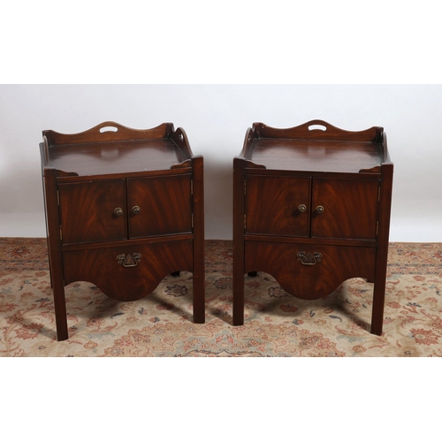 454 - A PAIR OF GEORGIAN STYLE MAHOGANY PEDESTALS each of rectangular outline with moulded gallery with gl... 