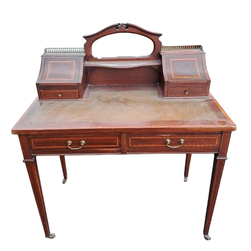 474 - AN EDWARDIAN MAHOGANY AND SATINWOOD INLAID DESK of rectangular outline the superstructure with oval ... 