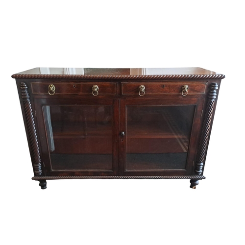 475 - A REGENCY MAHOGANY AND BRASS INLAID SIDE CABINET of rectangular outline the shaped top with gadroone... 