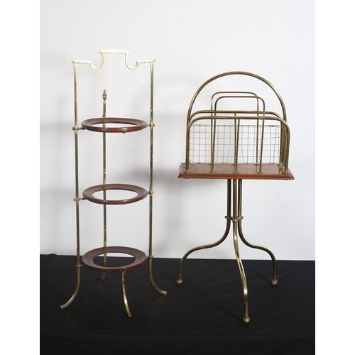 501 - A VINTAGE MAHOGANY AND BRASS THREE TIER CAKE STAND on scroll supports
79cm (h) x 28cm (w) x 25cm (d)... 