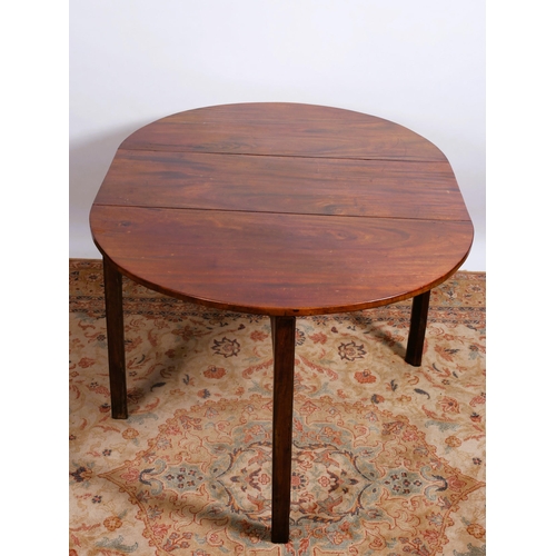 64 - A GEORGIAN MAHOGANY DROP LEAF TABLE the oval hinged top raised on square moulded legs
72cm (h) x 43c... 