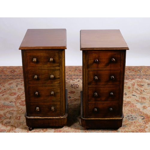 65 - A PAIR OF 19TH CENTURY MAHOGANY PEDESTALS each of rectangular outline the shaped top above four mock... 