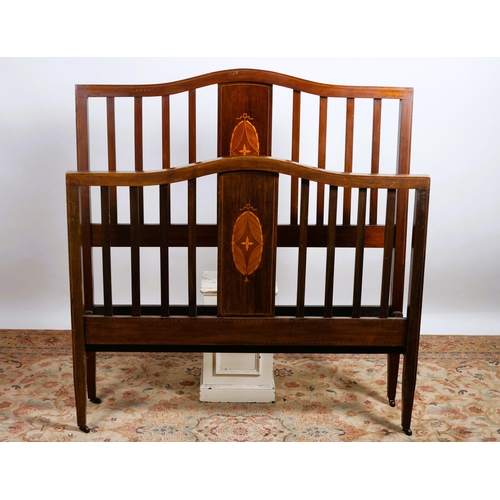 68 - TWO EDWARDIAN MAHOGANY AND SATINWOOD INLAID BED ENDS each of rectangular arched form with slatted up... 