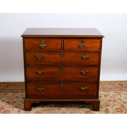 72 - A 19TH CENTURY MAHOGANY CROSSBANDED CHEST of rectangular outline the shaped top with two short and t... 