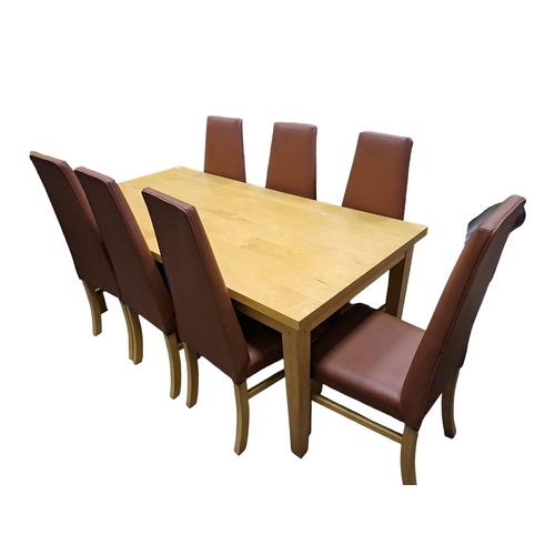 731 - A NINE PIECE DINING ROOM SUITE comprising eight upholstered dining chairs each with a rectangular ta... 