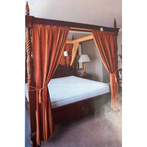 771 - A MAHOGANY FOUR POSTER BED the panelled headboard with scroll flowerhead and foliate cresting betwee... 