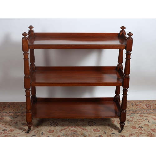 81 - A 19TH CENTURY MAHOGANY THREE TIER DUMBWAITER of rectangular outline the shaped top with moulded thr... 