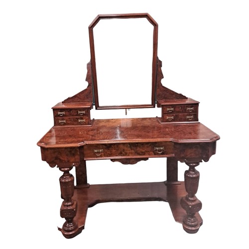 267 - A 19TH CENTURY BURR WALNUT DRESSING TABLE the superstructure with swivel mirror flanked on each side... 