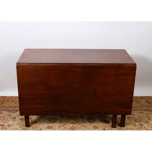 491 - A GEORGIAN MAHOGANY DROP LEAF TABLE the oval hinged top raised on square moulded legs 
74cm (h) x 27... 