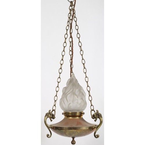 875 - A VINTAGE BRASS CENTRE LIGHT with frosted glass flame shade above dish shaped under tier with scroll... 