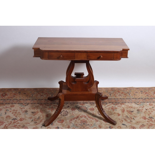 207 - A REGENCY DESIGN MAHOGANY SIDE TABLE of rectangular bowed outline the shaped top above a duel lyre s... 