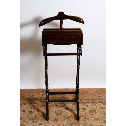 31 - A MAHOGANY VALET of typical form with two frieze drawers on spiral twist supports with splayed legs ... 