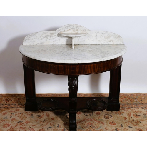 41 - A 19TH CENTURY MAHOGANY WASH STAND of demi lune outline the shaped top with white veined marble top ... 