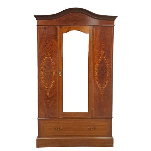 46 - AN EDWARDIAN MAHOGANY AND MARQUETRY WARDROBE the rectangular arched cornice above a bevelled glass m... 