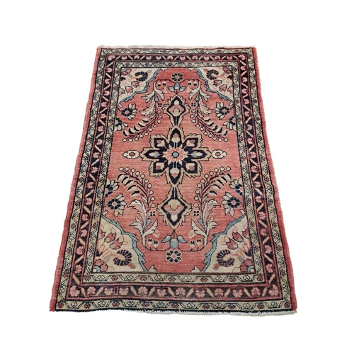 596 - THREE SMALL TRIBAL WOOL RUGS 
Larger 166cm (l) x 108cm (w)
One 155cm (l) x 55cm (w) 
Smaller 83cm (l... 