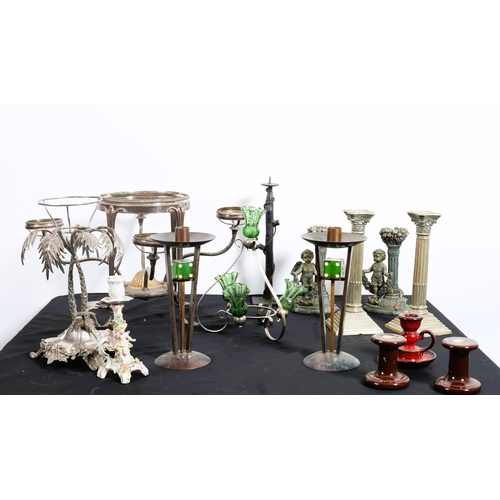 693 - A COLLECTION OF PLATED WARE to include coffee pots, teapots, Corinthian column candlesticks, swing h... 