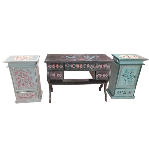 709 - A PAIR OF VINTAGE PINE AND POLYCHROME PEDESTALS each of rectangular outline the shaped top with cupb... 