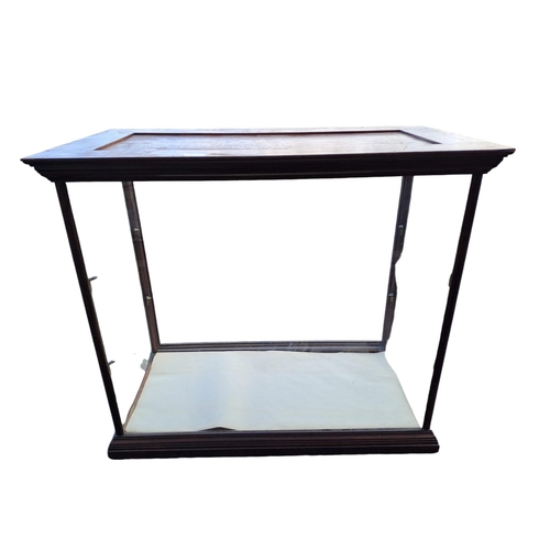 715 - A VINTAGE FRY'S CADBURYS MAHOGANY AND GLAZED DISPLAY CASE of rectangular outline the shaped top abov... 