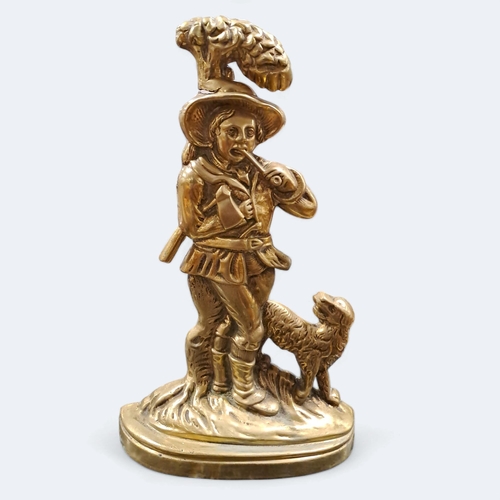 727 - A BRASS AND LEAD FIGURAL DOOR STOP modelled as a young huntsman with dog
36cm (h)