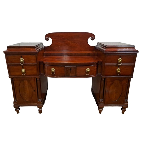 64 - A GOOD GEORGIAN MAHOGANY PEDESTAL SIDEBOARD of rectangular bowed outline the moulded back above a fr... 