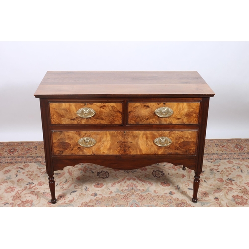 69 - A VINTAGE WALNUT CHEST of rectangular outline the shaped top with two short and one long drawer with... 