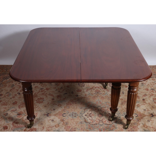 214 - A GOOD WILLIAM IV MAHOGANY TELESCOPIC DINING TABLE of rectangular outline with rounded corners and t... 