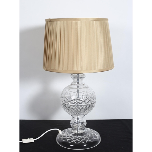 263 - A GALWAY CRYSTAL CUT GLASS TABLE LAMP the bulbous column above a circular spreading foot with pleate... 