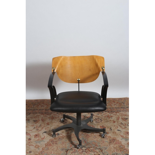 348 - AN EAMES STYLE REVOLVING DESK CHAIR the shaped back with upholstered seat with metal arms and base w... 