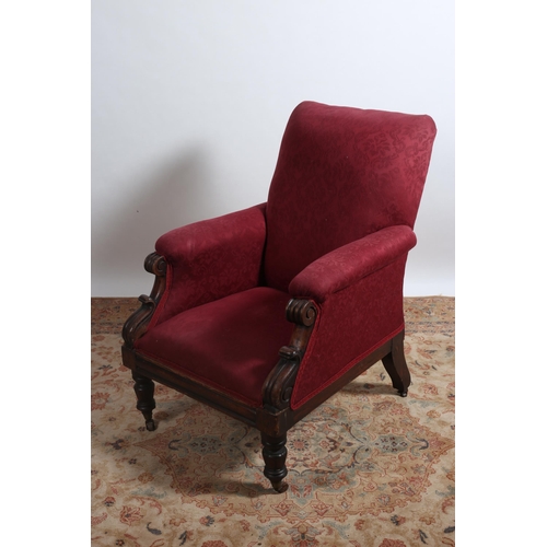 393 - A WILLIAM IV MAHOGANY AND UPHOLSTERED ARMCHAIR the scroll over upholstered back and seat with uphols... 