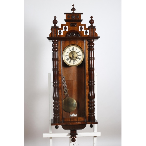 274 - A 19TH CENTURY WALNUT AND MAHOGANY VIENNA CLOCK the rectangular case with shaped pediment headed wit... 