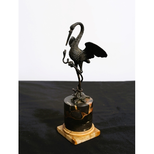 466 - A 19TH CENTURY CAST BRONZE FIGURE modelled as a stork holding a serpent shown standing on a turtle r... 