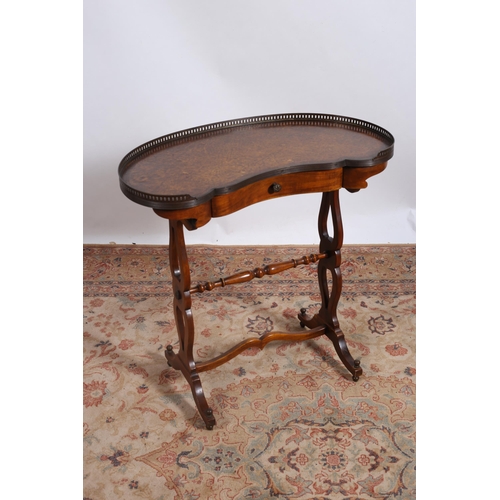 15 - **WITHDRAWN** A THEODORE ALEXANDER OCCASIONAL TABLE of kidney shaped outline the shaped top with too... 