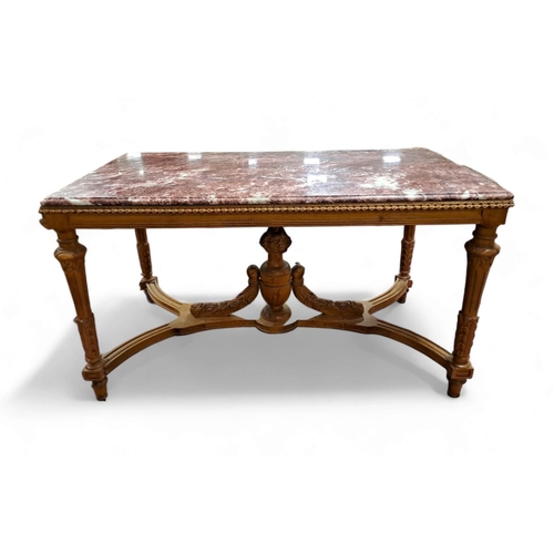 193 - A CONTINENTAL CARVED FRUITWOOD AND MARBLE CENTRE TABLE surmounted by a pink veined marble top above ... 