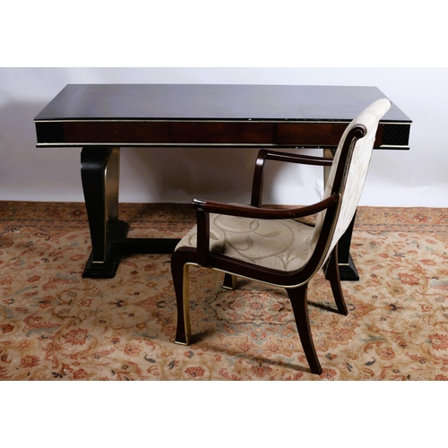 199 - A CONTINENTAL ROSEWOOD AND PARCEL GILT DESK of rectangular outline the shaped top with frieze drawer... 