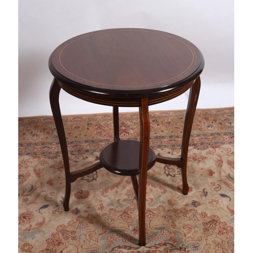 237 - A VINTAGE MAHOGANY AND SATINWOOD INLAID OCCASIONAL TABLE of circular outline the shaped top above a ... 