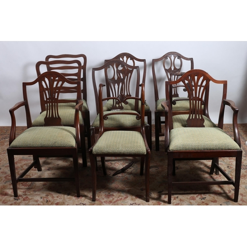 239 - AN ELEVEN PIECE MAHOGANY DINING ROOM SUITE comprising a 19th century Hepplewhite style economy dinin... 