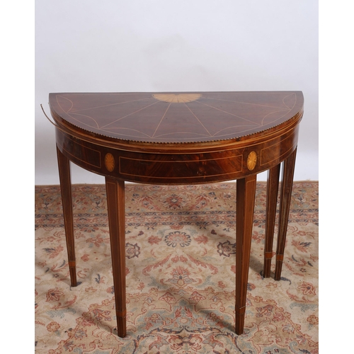 241 - A SHERATON DESIGN MAHOGANY AND SATINWOOD INLAID FOLDOVER CARD TABLE of demi lune outline the hinged ... 