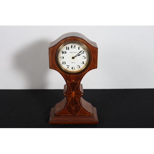 312 - A 19TH CENTURY MAHOGANY AND SATINWOOD INLAID MANTEL CLOCK the shaped case containing a white enamel ... 