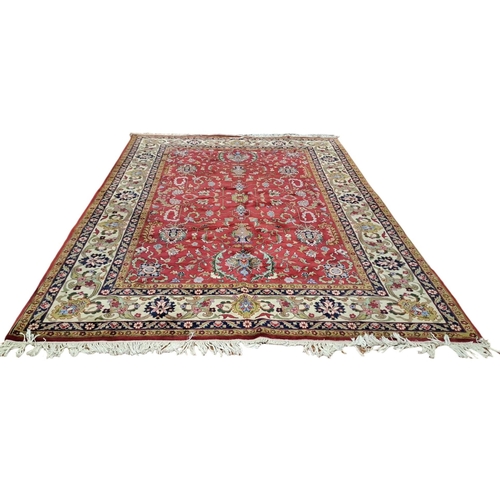 324 - A SAROUK WOOL RUG the wine, beige and indigo ground with central panel filled with serrated panels, ... 