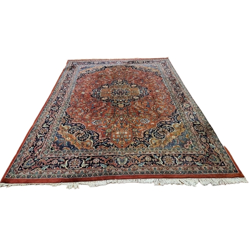 329 - A TABRIZ WOOL RUG the multicoloured ground with central panel filled with flowerheads and foliage wi... 