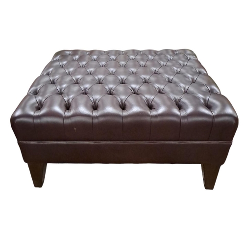 331 - A CHERRYWOOD AND HIDE UPHOLSTERED STOOL of rectangular outline the shaped deep buttoned upholstered ... 