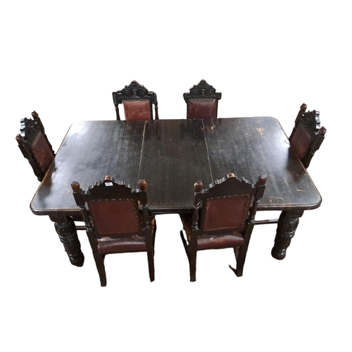 332 - A 19TH CENTURY CARVED OAK SEVEN PIECE DINING ROOM SUITE comprising six dining chairs each with a sha... 