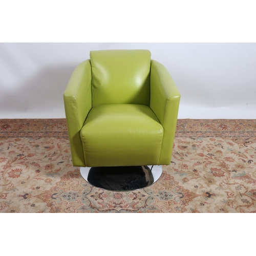 333 - A GREEN HIDE UPHOLSTERED AND CHROME SWIVEL DESIGNER CHAIR the tub shaped seat above a revolving base... 