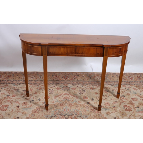 334 - A YEW WOOD CONSOLE TABLE of rectangular shaped outline the moulded top above a panelled apron on squ... 