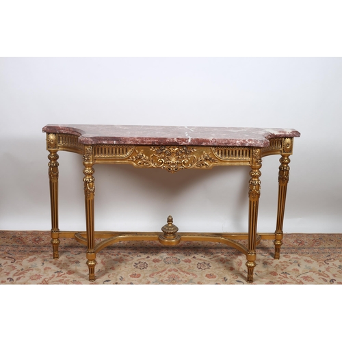 354 - A CONTINENTAL GILTWOOD AND MARBLE CONSOLE TABLE of rectangular shaped outline surmounted by a rouge ... 