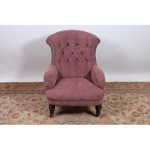 369 - A 19TH CENTURY MAHOGANY AND UPHOLSTERED EASY CHAIR with deep button upholstered back and seat on tur... 