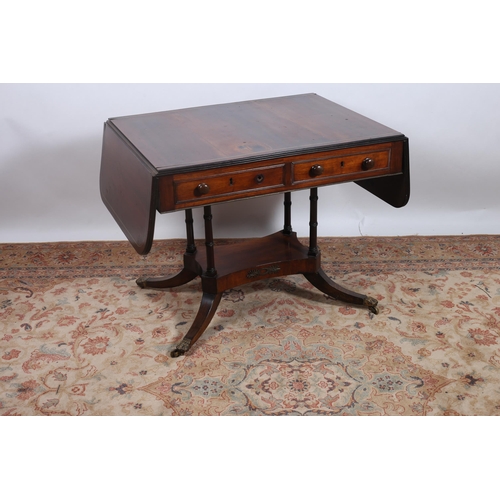 373 - A REGENCY ROSEWOOD AND BRASS INLAID SOFA TABLE the rectangular hinged top above two frieze drawers w... 